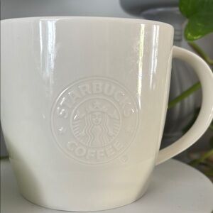 Starbucks White Ceramic Mug with Embossed Logo Accent